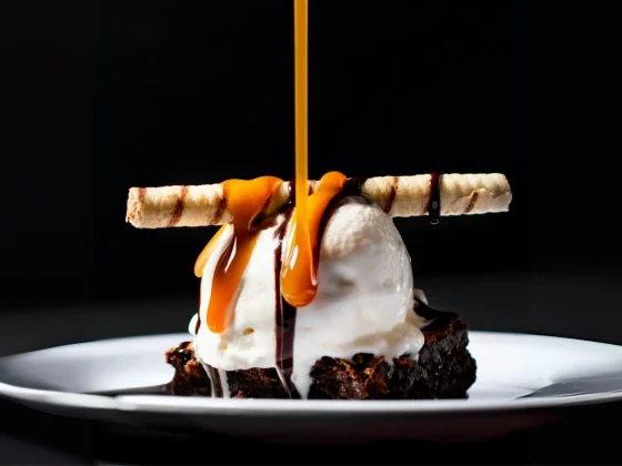 Decadent dessert challenging diet myths, featuring a caramel drizzle over ice cream and brownie