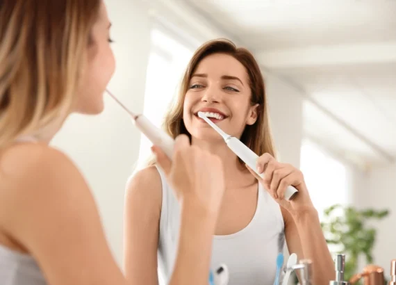 Woman brushing her teeth