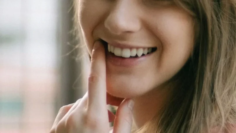 smiling woman showing good oral hygiene