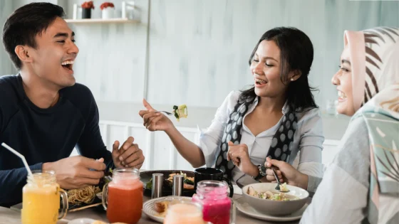 Friends eating together celebrating the end of their fasting period