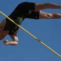 włodzimierz jaworski in a pole vault representing health and longevity