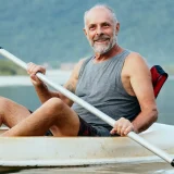 man canoeing